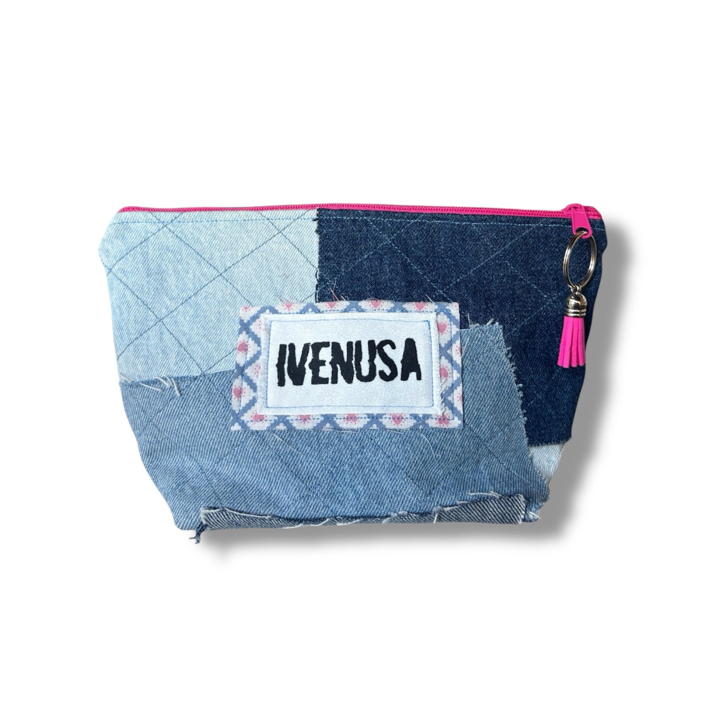 Patchwork denim makeup bag with quilted texture, pink zipper, and IVENUSA fabric logo tag