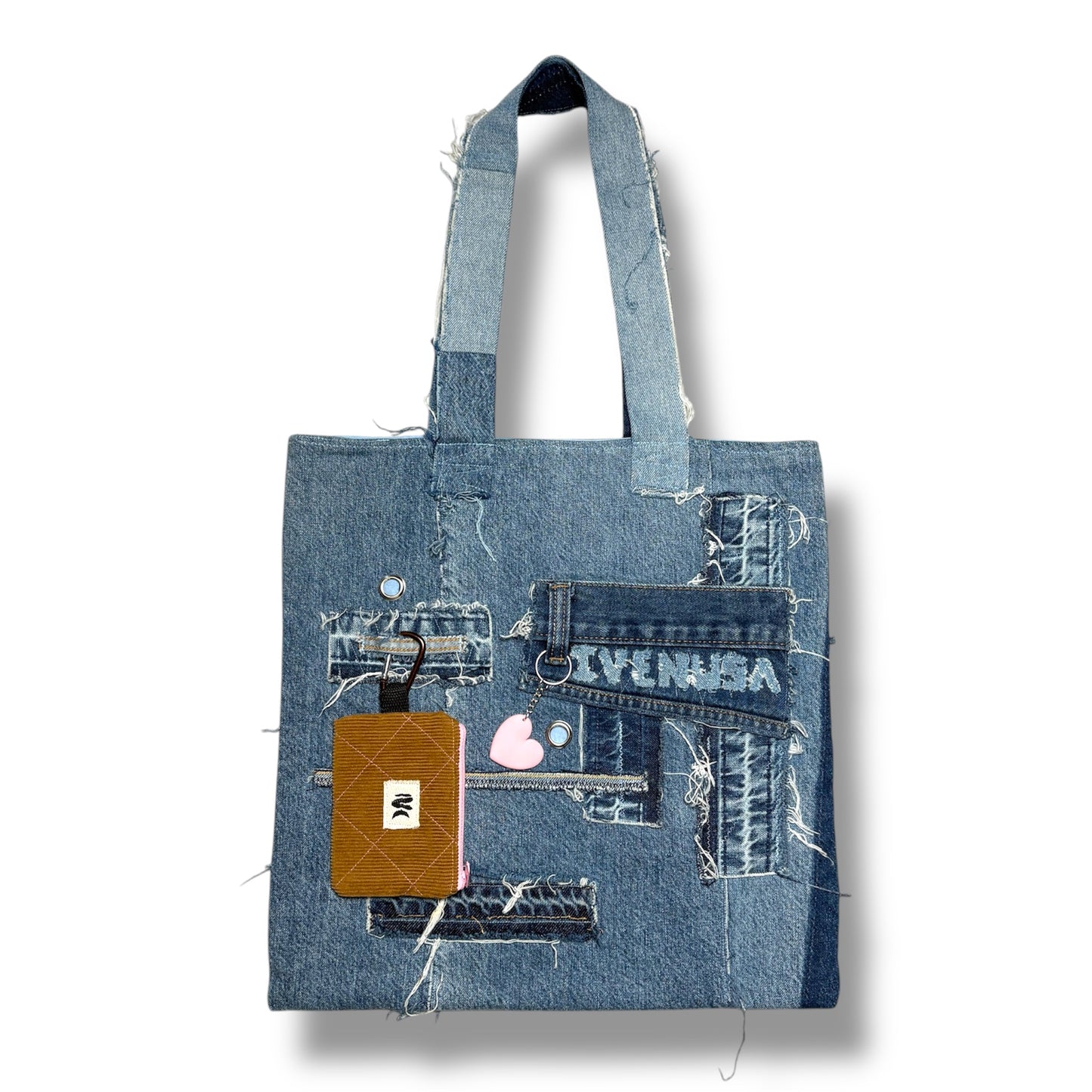 Handmade denim tote bag featuring boho-style patches and brown wallet
