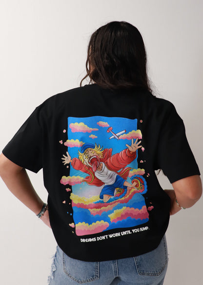 Rear view of black DMR oversized t-shirt with colorful graphic artwork