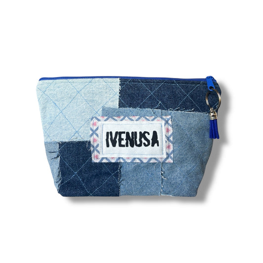 Patchwork denim makeup bag with quilted texture, blue zipper, and IVENUSA fabric logo tag