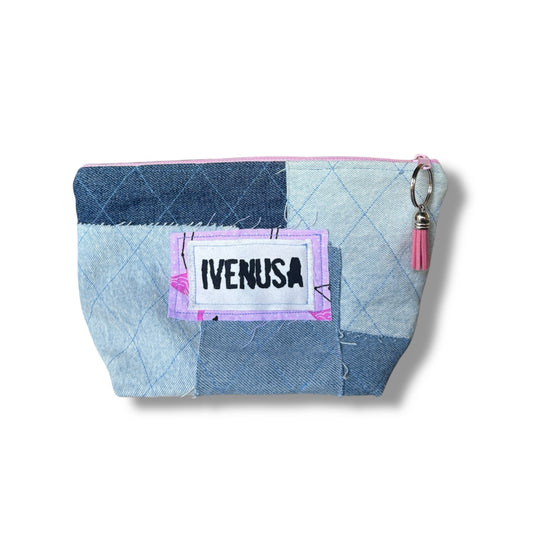 Patchwork denim makeup bag with quilted texture, blush zipper, and IVENUSA fabric logo tag