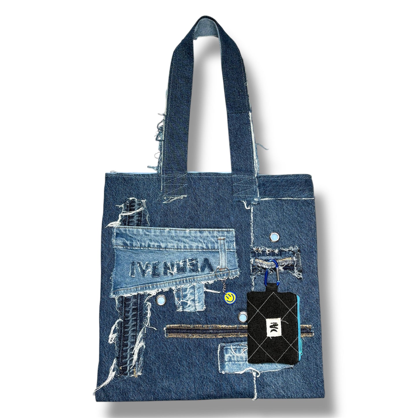 Handmade denim tote bag featuring boho-style patches and black wallet